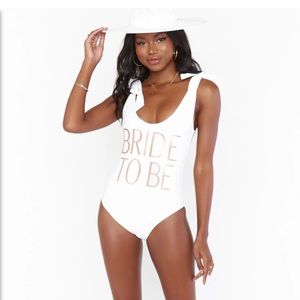 Show Me Your MUMU white “Bride to Be” swimsuit